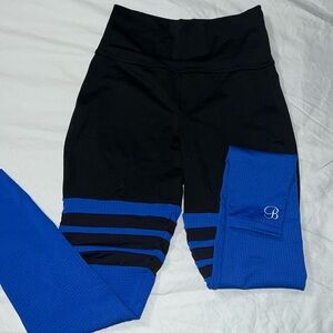Bombshell leggings in blue and black. Size medium- good condition